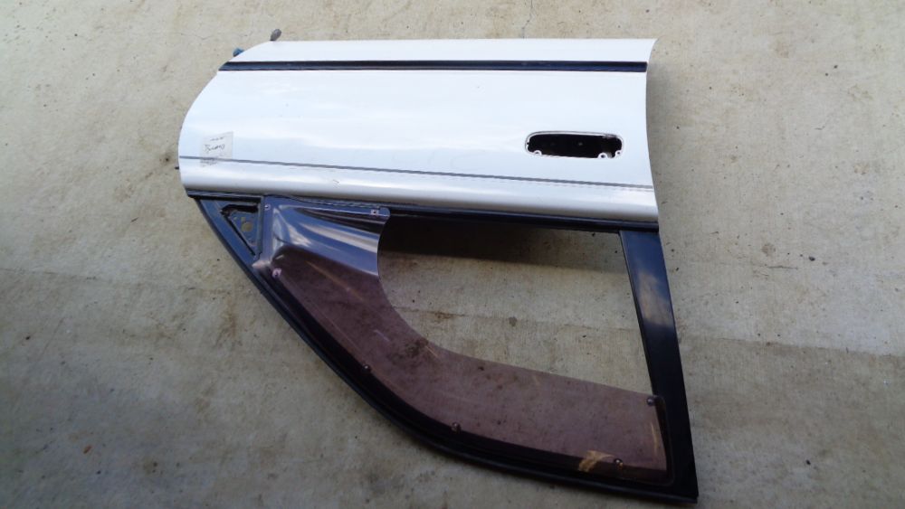 USED Right (Driver) front door shell to suitable for Toyota Corolla Sedan VGC