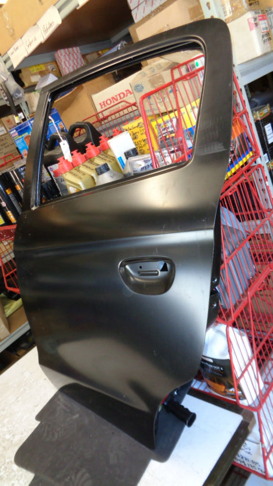 Mitsubishi Mirage Genuine left hand rear door assy new part