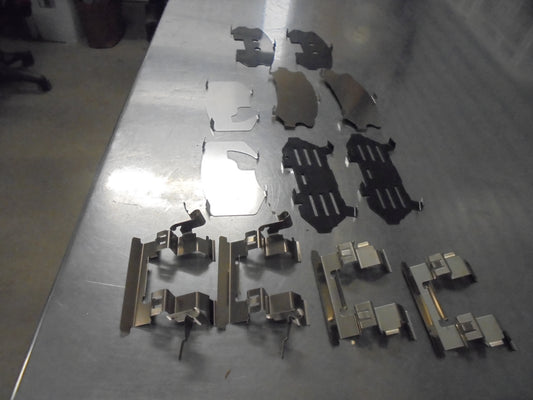 Nissan Tiida Genuine Hardware Kit Front Disc Brake Pad New Part