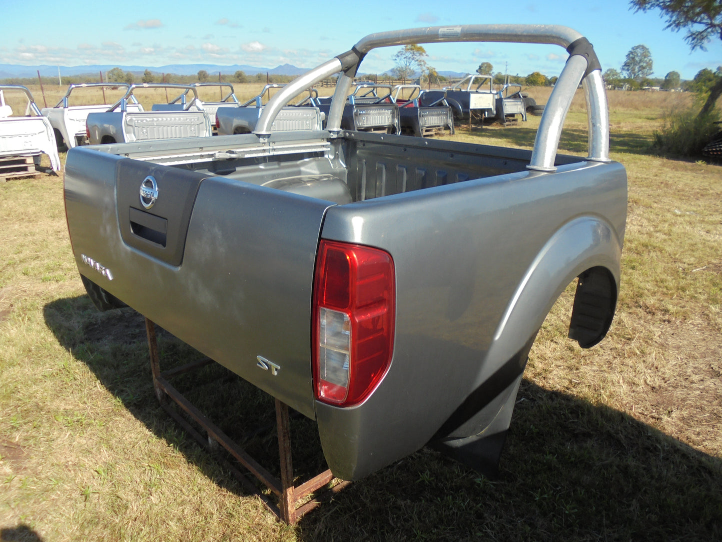 Nissan Navara ST dual cab tub Dark Grey in colour with alloy roll bar