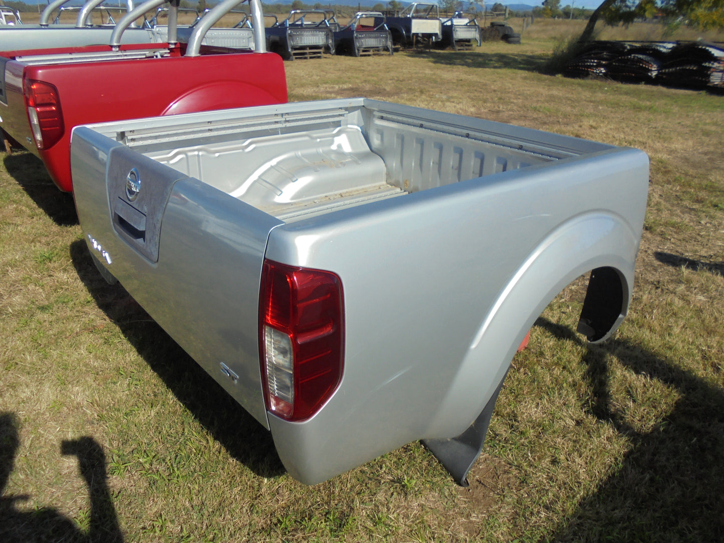 Nissan Navara ST dual cab tub silver in colour with alloy roll bar