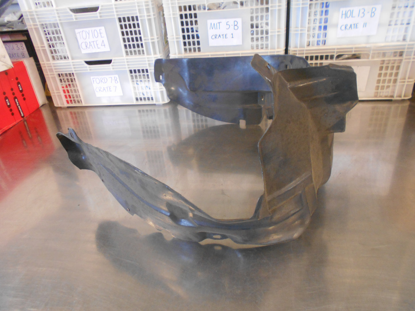 FORD LASER Right Hand Front Guard Liner New Part