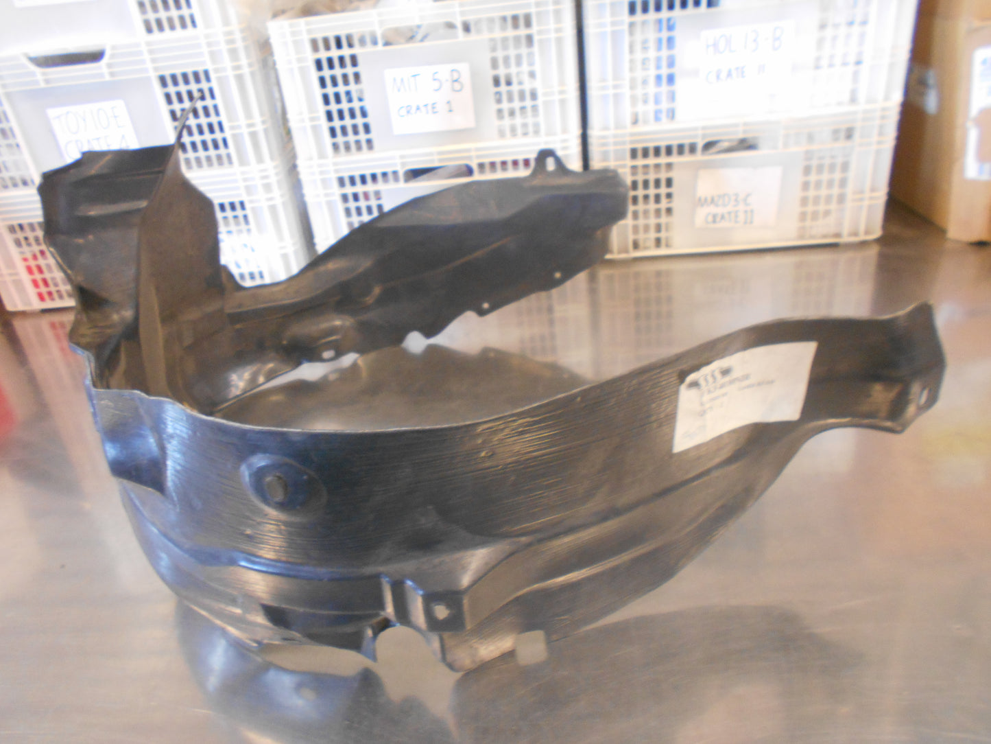 FORD LASER Right Hand Front Guard Liner New Part