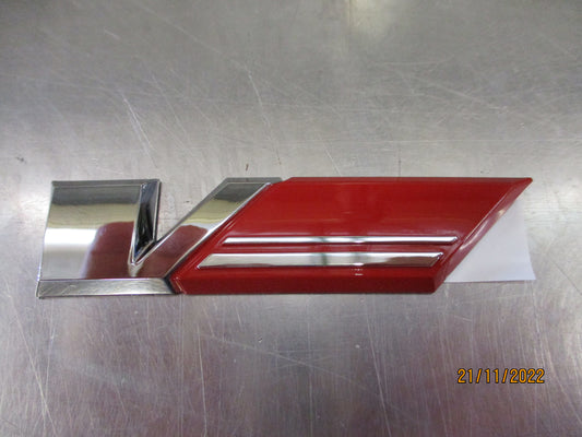 Holden VE SS-SSV Commode Genuine Chrome Emblem And Red V-Flag New Part