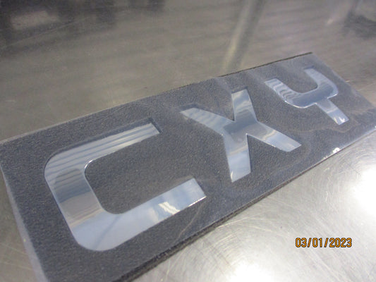 Isuzu Giga CXY Genuine Chrome Cab Emblem New Part