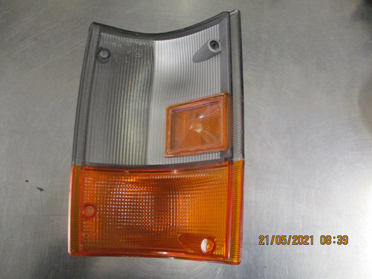 Isuzu NKR Genuine Front Left Lens Cover New Part