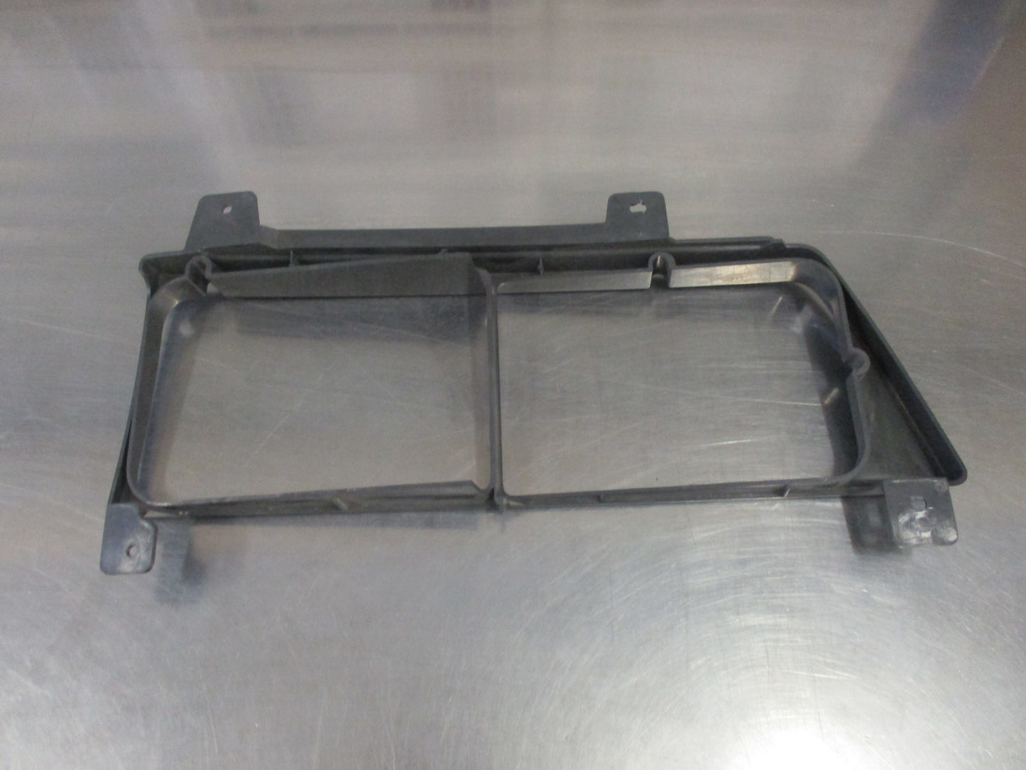 Isuzu NPS Genuine Left Hand Headlight Surround Used VGC