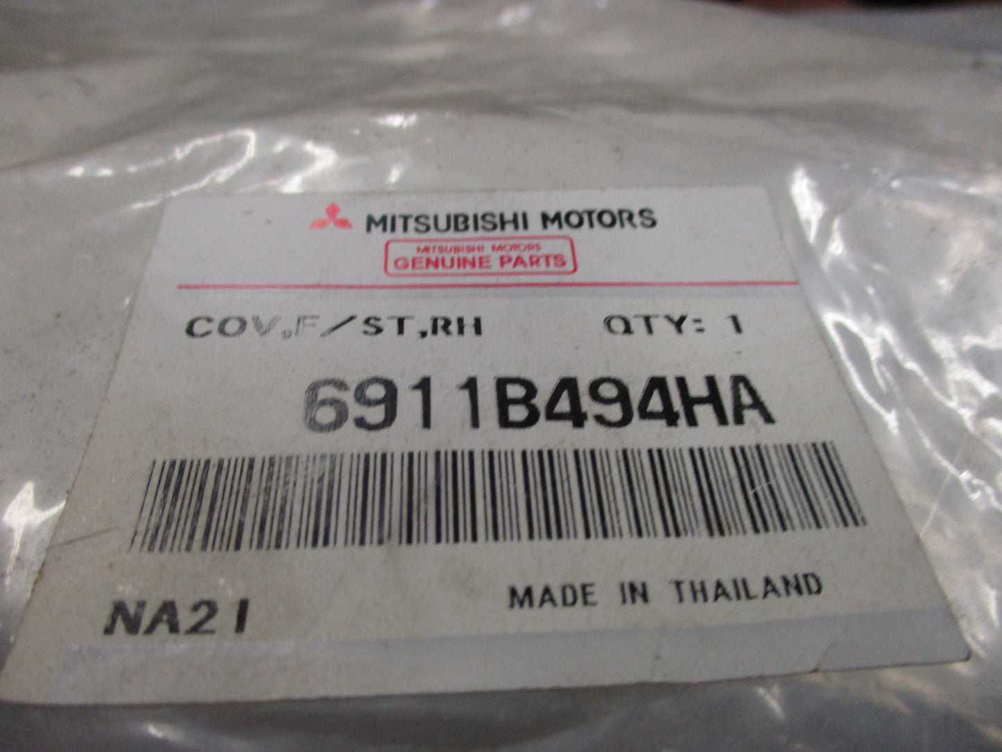 Mitsubishi MQ Triton Genuine Right Hand Front Seat Base Cover New Part