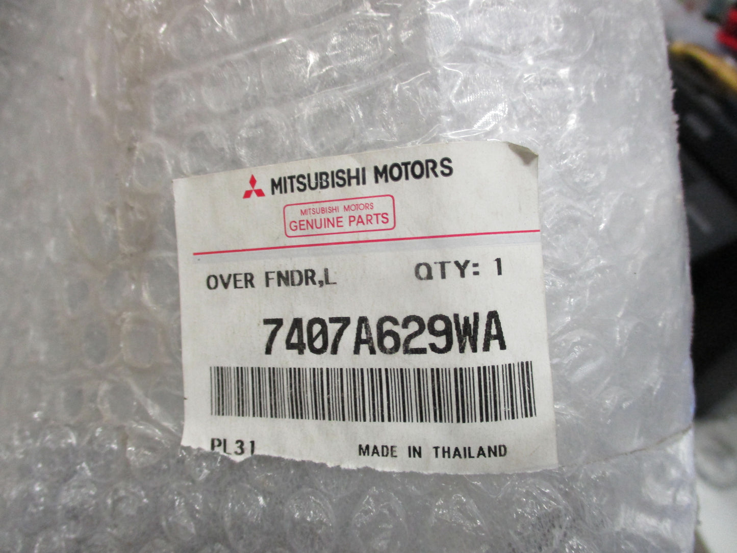 Mitsubishi Triton Genuine Over Fender Rear Left New Part