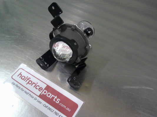 Holden MJ Barina Spark Hatch Back Genuine Drivers Side Fog Light New Part