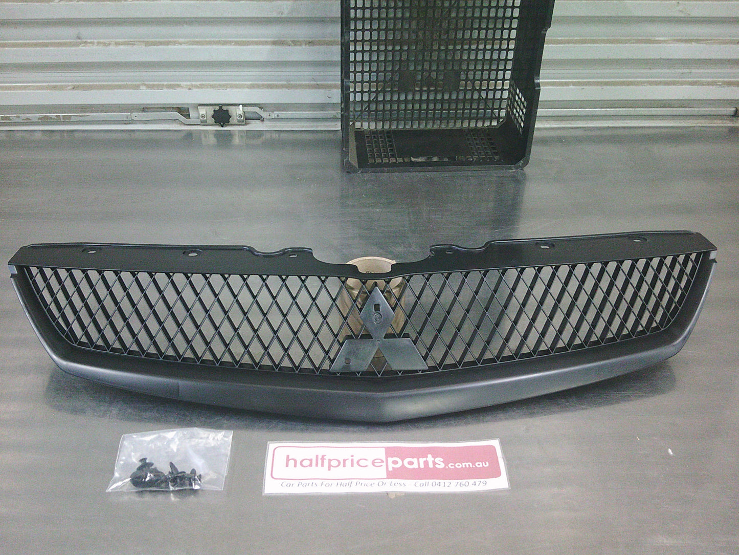 Mitsubishi 380 Genuine Front Grille Assembly - New Part