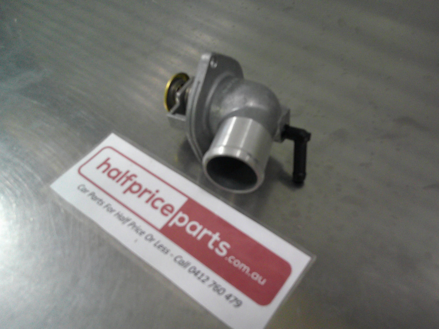 Holden XC Barina Hatch Back Genuine Thermostat And Housing Assembly New Part
