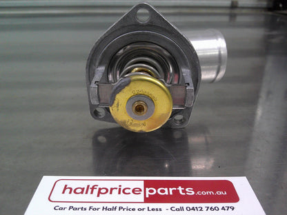 Holden XC Barina Hatch Back Genuine Thermostat And Housing Assembly New Part