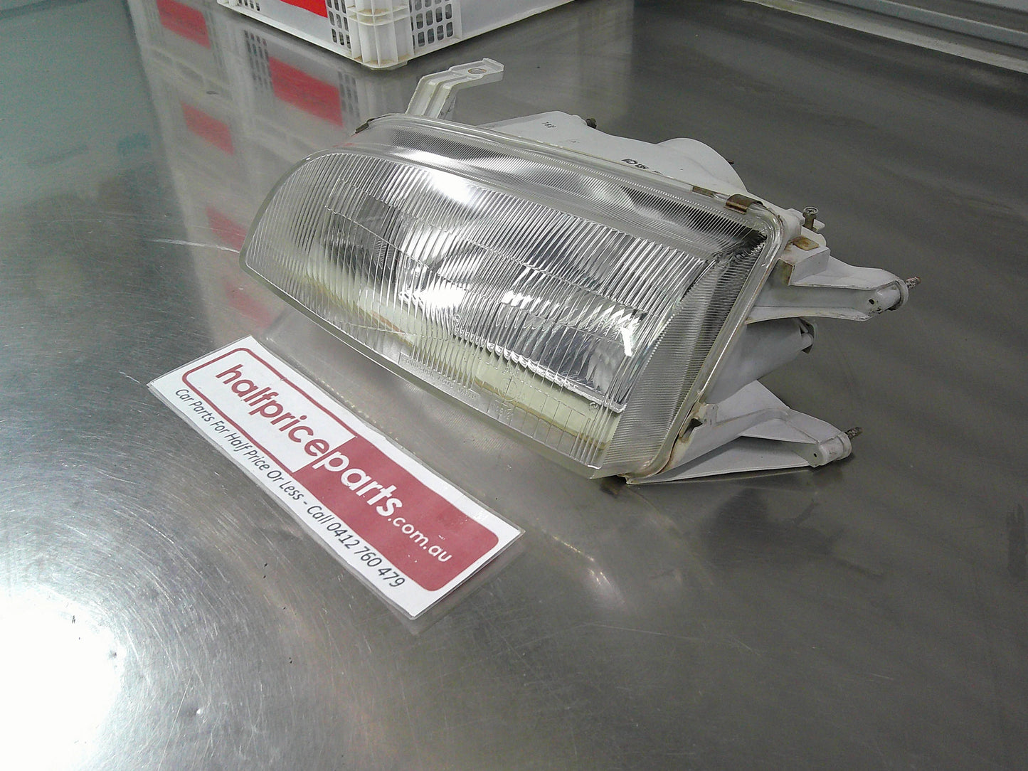Holden MF/MH Barina/Suzuki Swift Left Hand Headlight Reconditioned Used Part