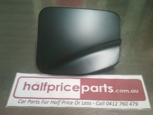 Holden TF/RA/RC Rodeo/Isuzu D-Max Genuine Outer Fuel Door Assembly (Unpainted) New Part