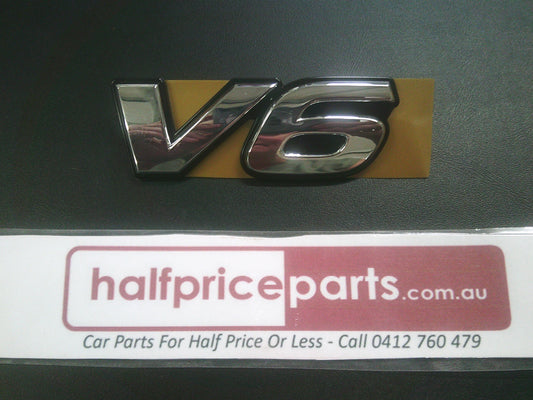 Toyota Hilux Genuine Front Grille Chrome V6 Emblem New Part