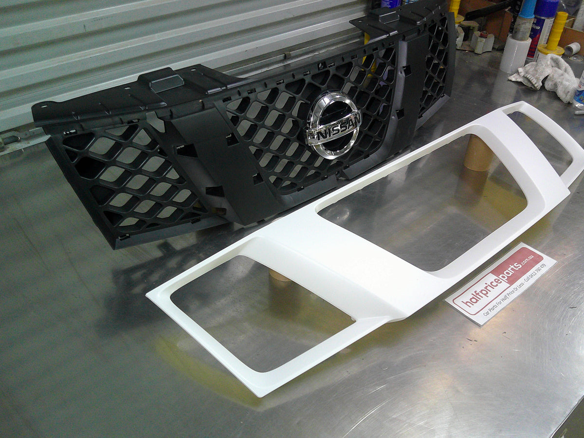 Nissan Pathfinder R51  Genuine 2 Piece Grille Set (With Emblem Unpainted) New Part