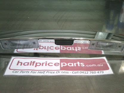 Holden JG Cruze Sedan Genuine Rear Chrome Boot Lid Garnish With Plate Lights New Part