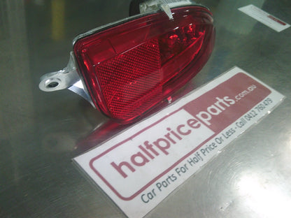 Holden Barina XC 3/5 Door Genuine Left Hand Rear Bumper Reflector New Part.