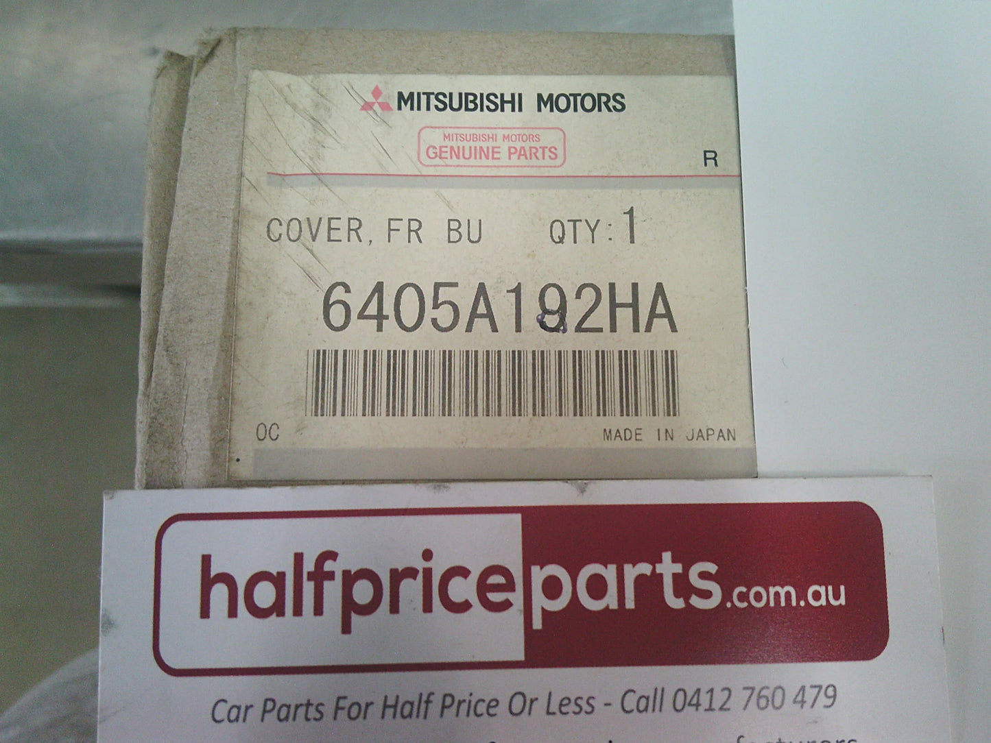 Mitsubishi Pajero Genuine Front License Plate Support Bar Trim (Factory Grey) New Part