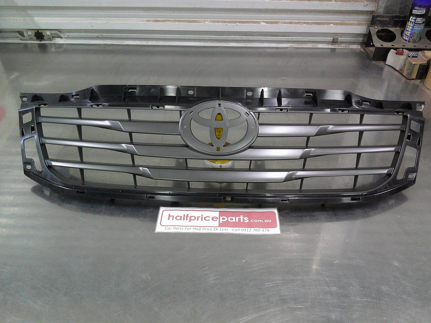 Toyota SR Hilux Genuine Front Grille Assembly (Frame Only) New Part