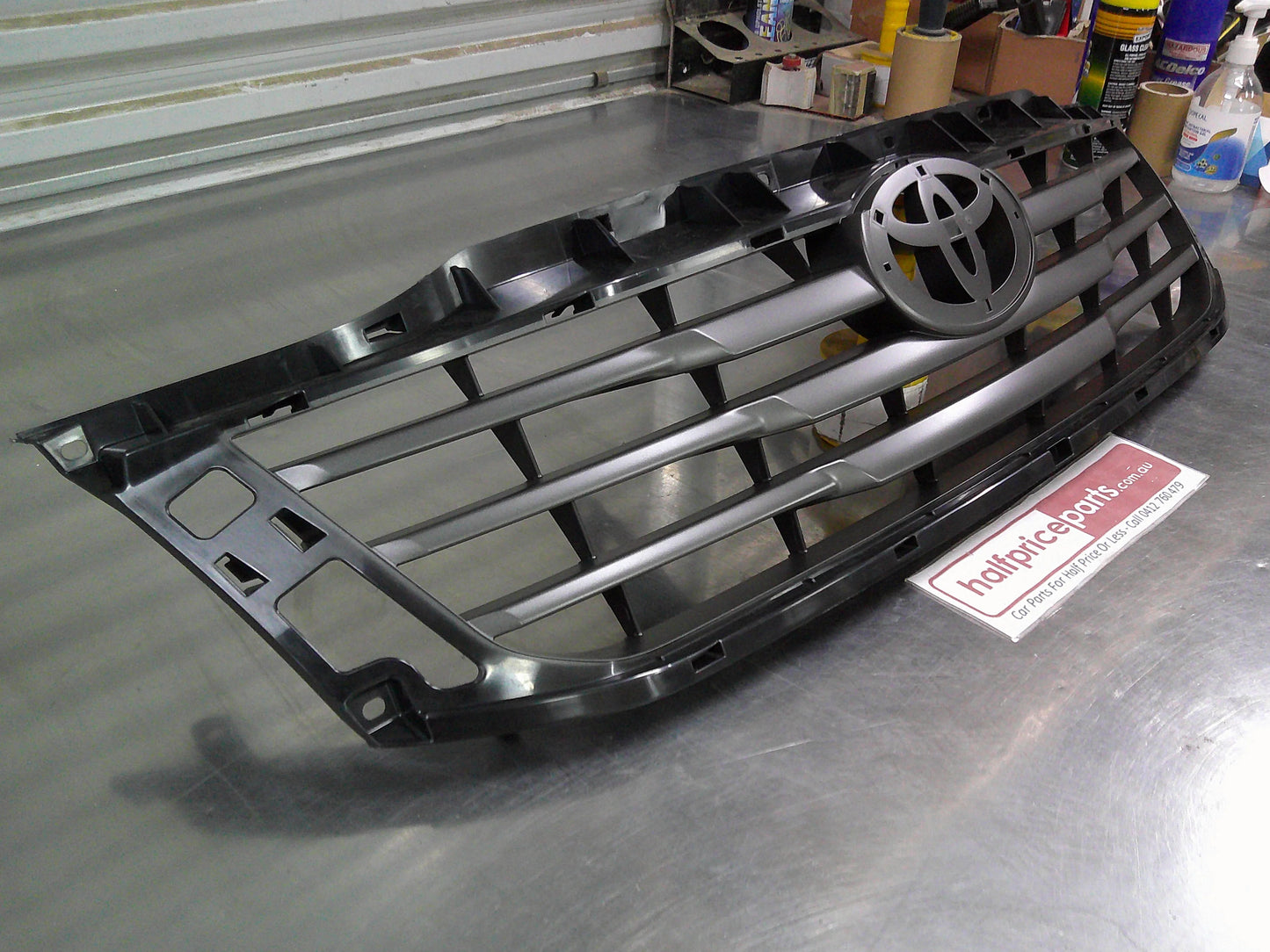Toyota SR Hilux Genuine Front Grille Assembly (Frame Only) New Part