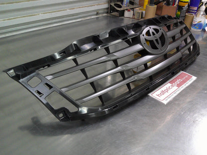 Toyota SR Hilux Genuine Front Grille Assembly (Frame Only) New Part