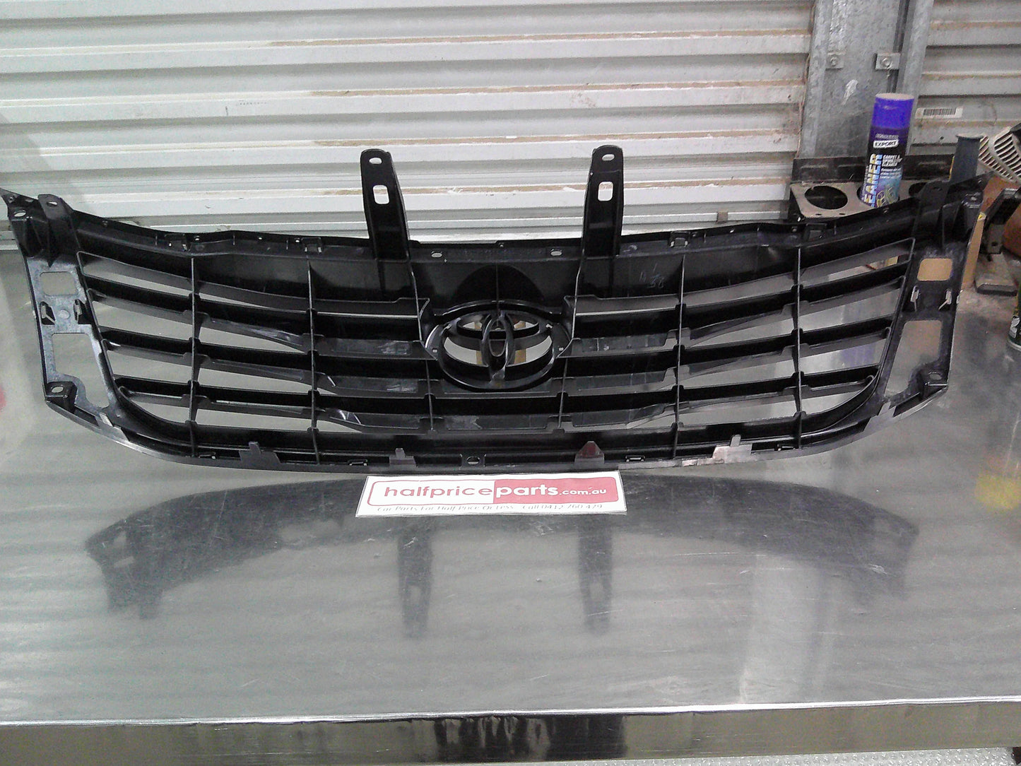 Toyota SR Hilux Genuine Front Grille Assembly (Frame Only) New Part