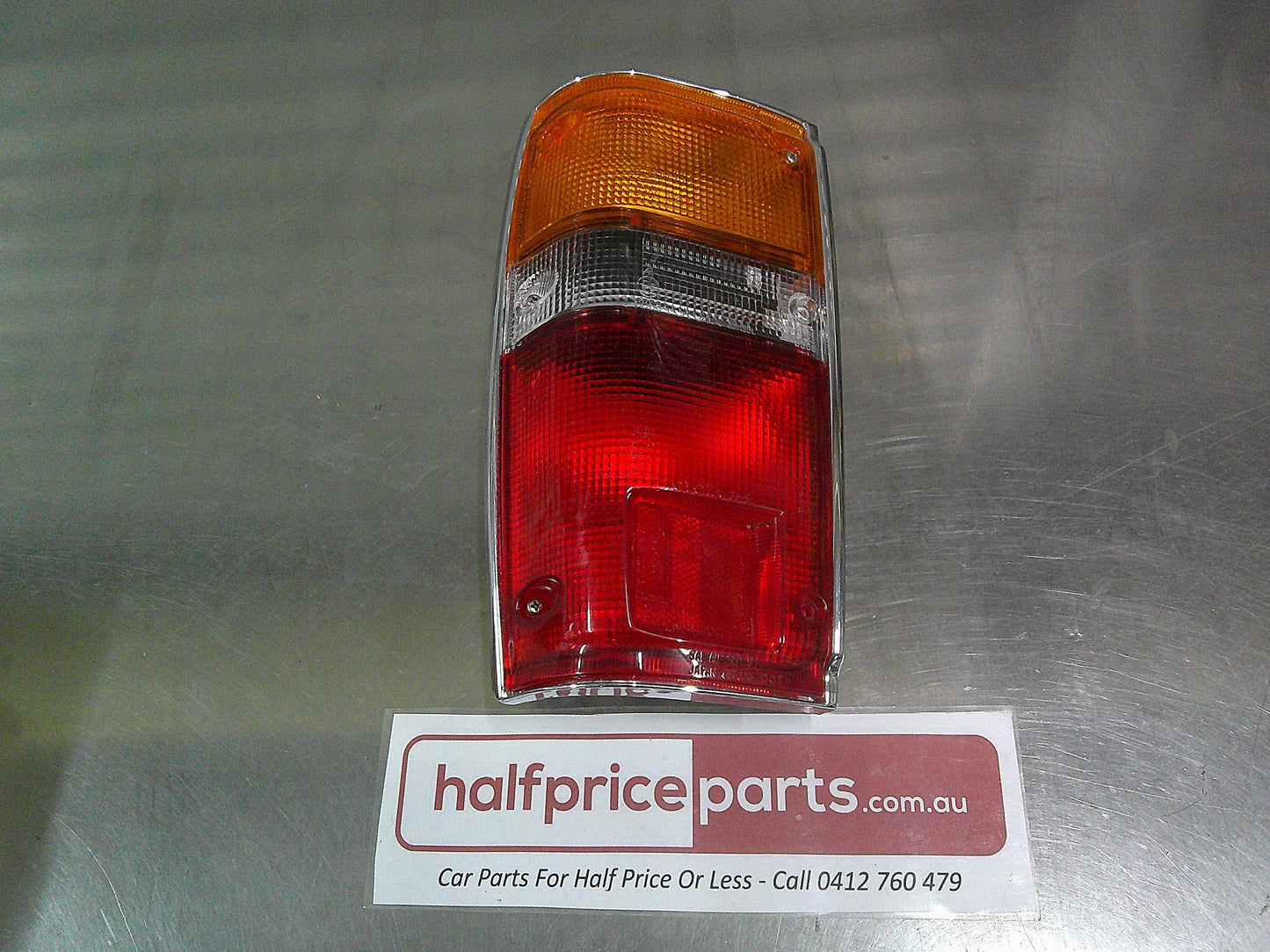 Toyota Hilux SR5 Genuine Left Hand Rear Tail Light Chrome Trim Tub Only New Part