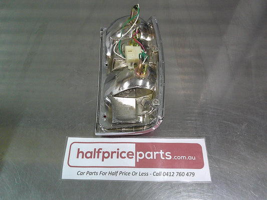 Toyota Hilux SR5 Genuine Left Hand Rear Tail Light Chrome Trim Tub Only New Part