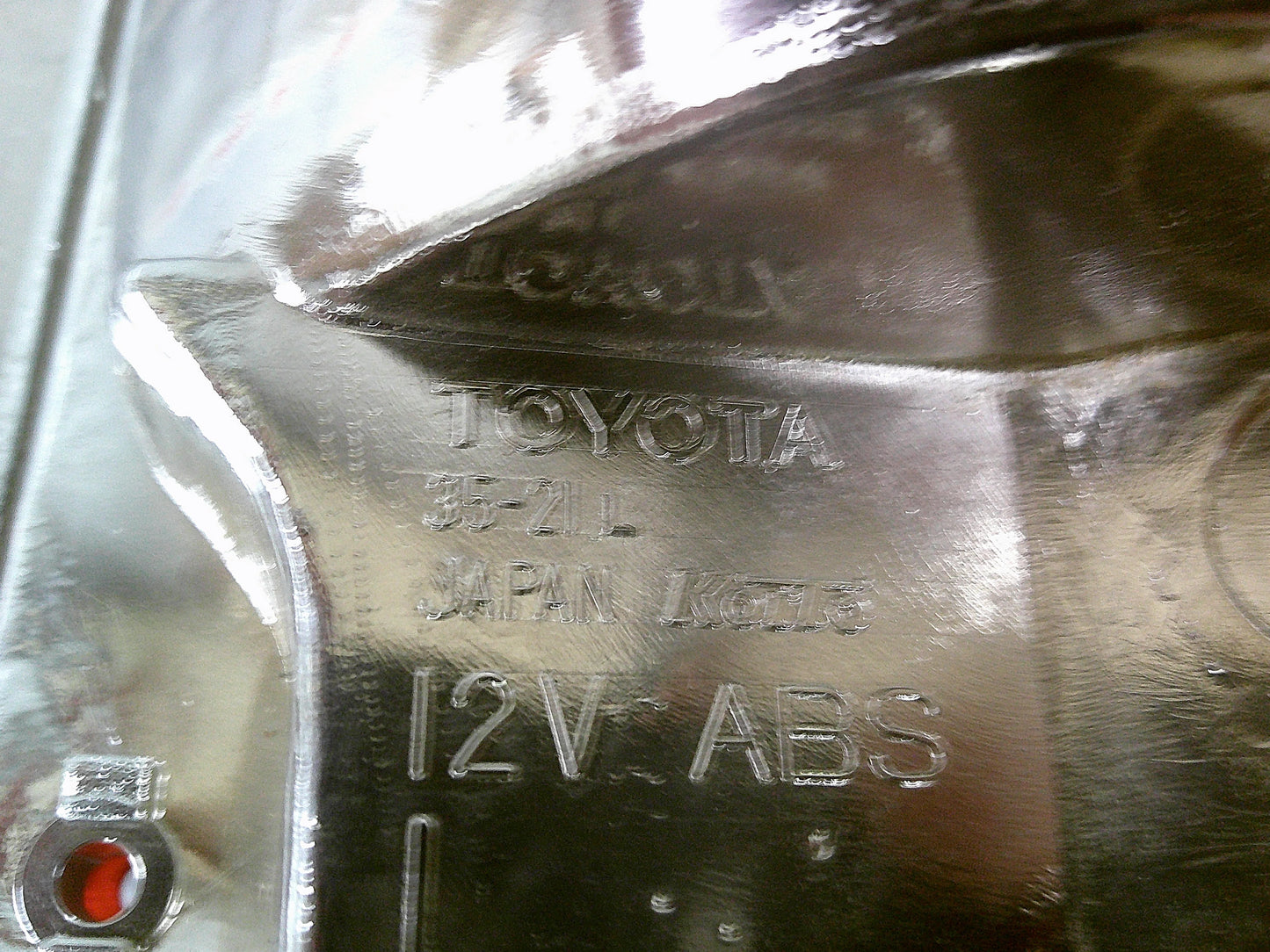 Toyota Hilux SR5 Genuine Left Hand Rear Tail Light Chrome Trim Tub Only New Part