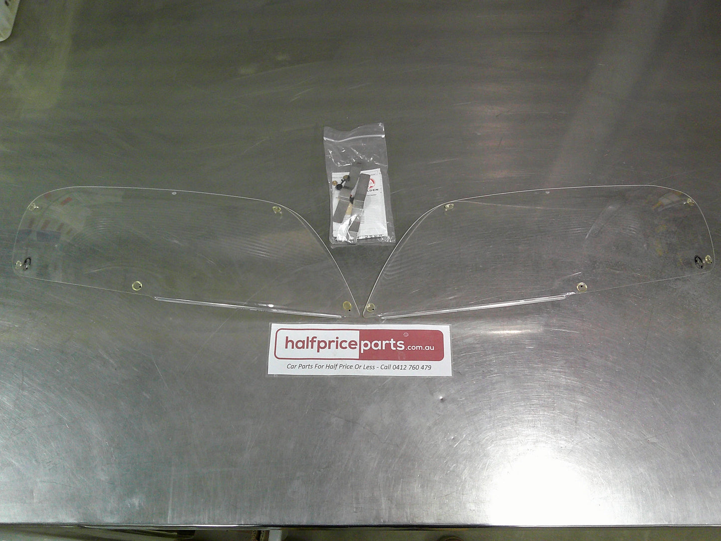 Holden TK Barina Genuine Headlight Protector Set (With Fitting Kit)  New Part