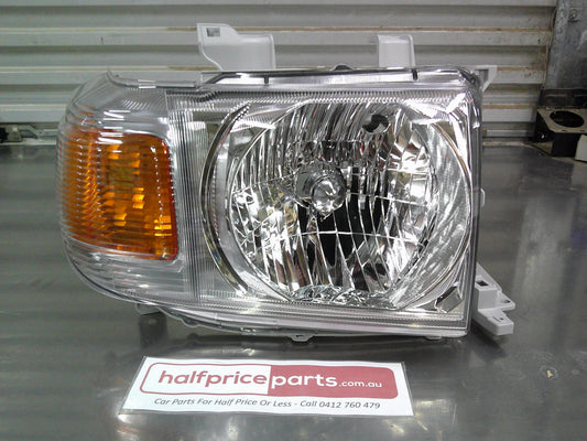 Toyota 76/78/79 70 Series Landcruiser Genuine Right Hand Front Head Light Assembly New Part