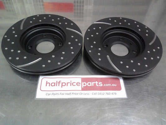 RDA Front Disc Rotors Slotted/Dimpled Suits Hyundai Accent RB/Kia Rio (Sold As Pair Only) New Part