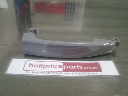 Holden TK Barina Genuine Right (Driver) Rear Outer Door Handle New Part