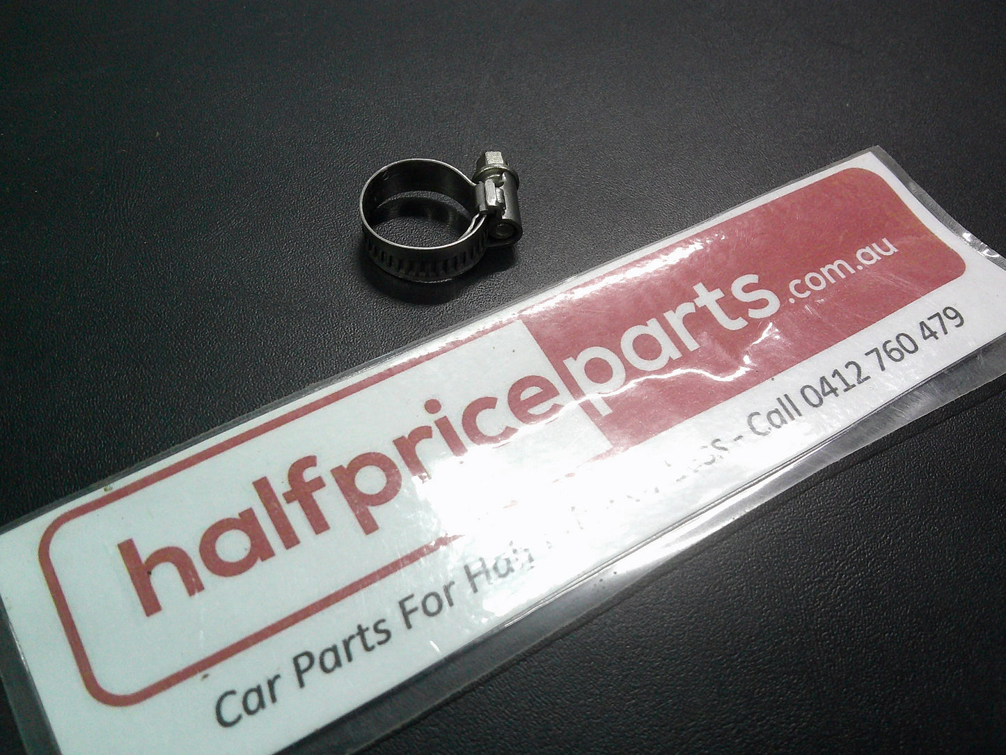 Holden VT/VX/VY Commodore Genuine Lower Reservoir Return Tube Clamp New Part