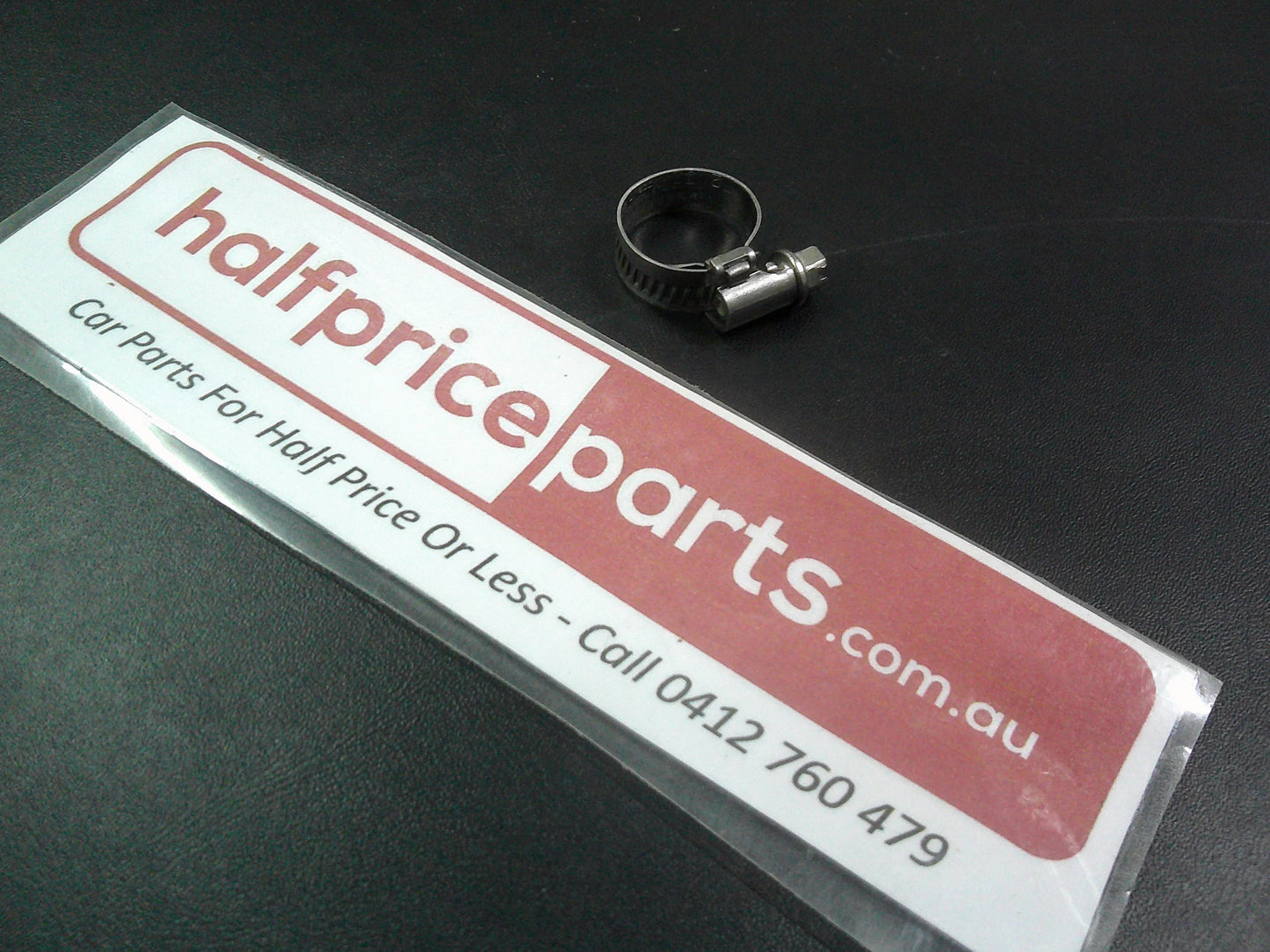 Holden VT/VX/VY Commodore Genuine Lower Reservoir Return Tube Clamp New Part