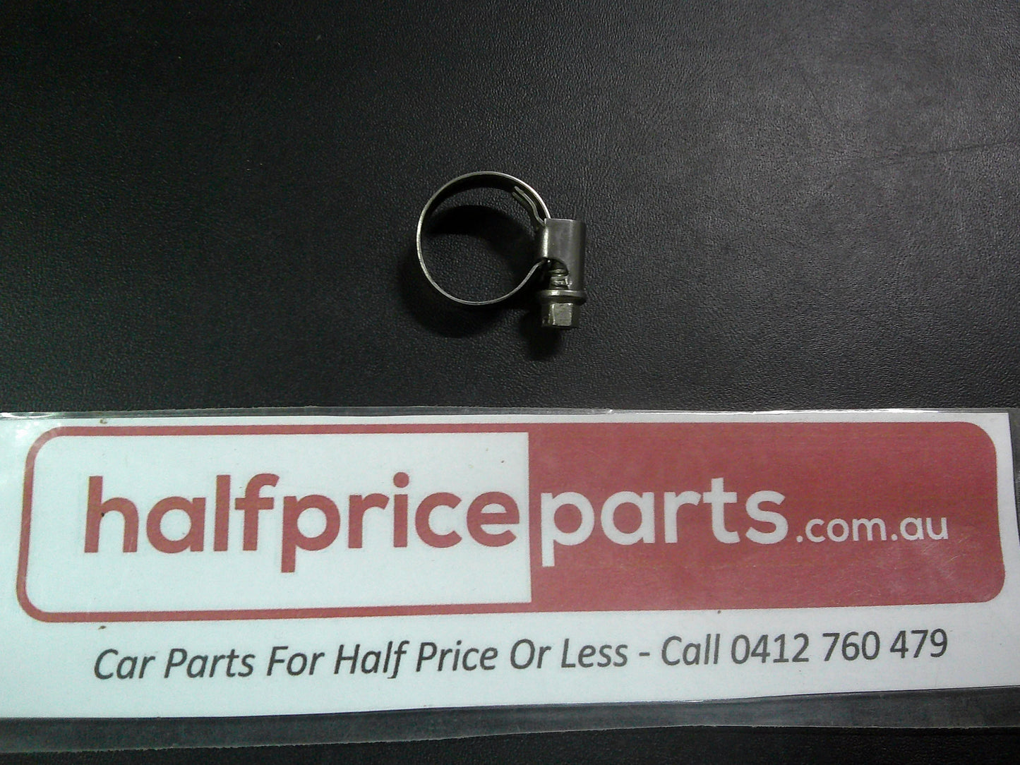 Holden VT/VX/VY Commodore Genuine Lower Reservoir Return Tube Clamp New Part