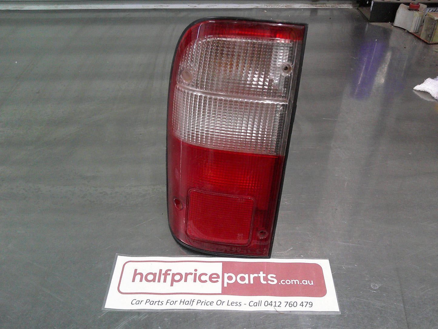 Koito Left Hand Rear Tub Tail light Suits Toyota Hilux Used Part