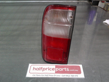 Koito Left Hand Rear Tub Tail light Suits Toyota Hilux Used Part
