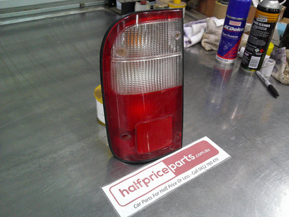 Koito Left Hand Rear Tub Tail light Suits Toyota Hilux Used Part
