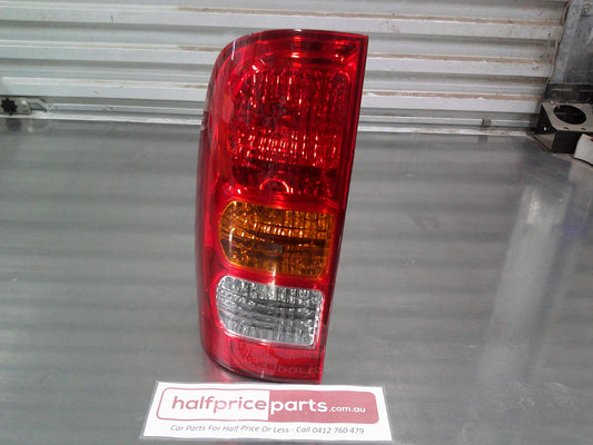 Toyota SR/SR5 Hilux Genuine Left Hand Rear Tub Tail Light Assembly New Part