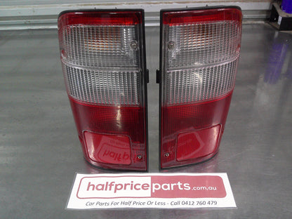 Koito Rear Tail Tub Lights Sold As Pair Only Suits Toyota Hilux Used Part