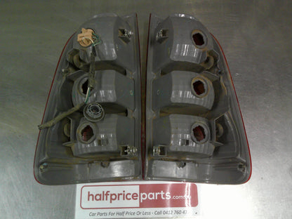 Toyota Hilux Genuine Left And Right Tub Tail lights Sold As Pair Used Part