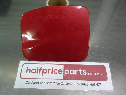 Holden RA Rodeo Genuine Fuel Flap Factory Red VGC Used Part