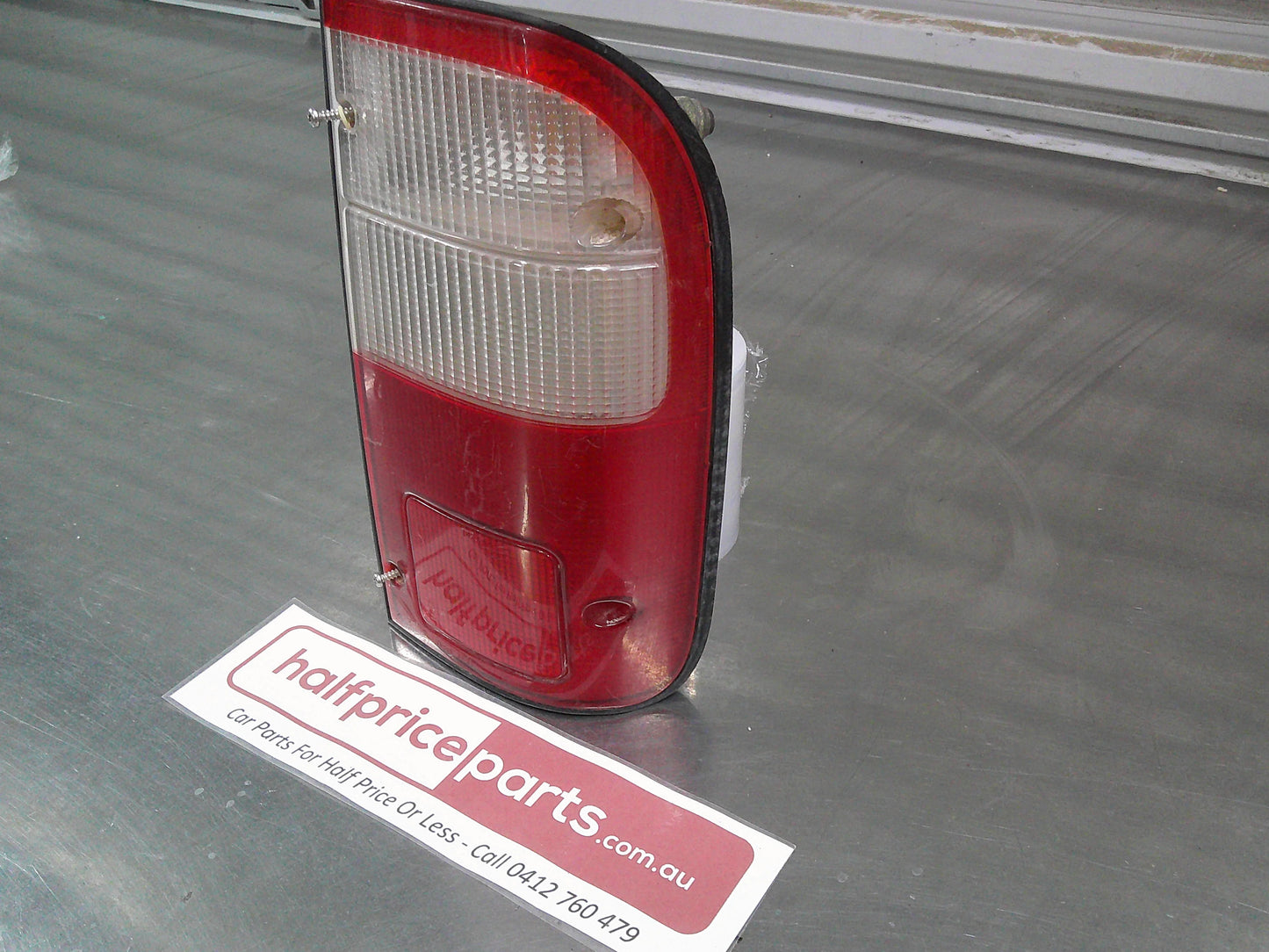 Koito Right Rear Tail Light Tub Suits Toyota Hilux Used Part