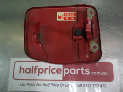 Holden RA Rodeo Genuine Fuel Flap Factory Red VGC Used Part