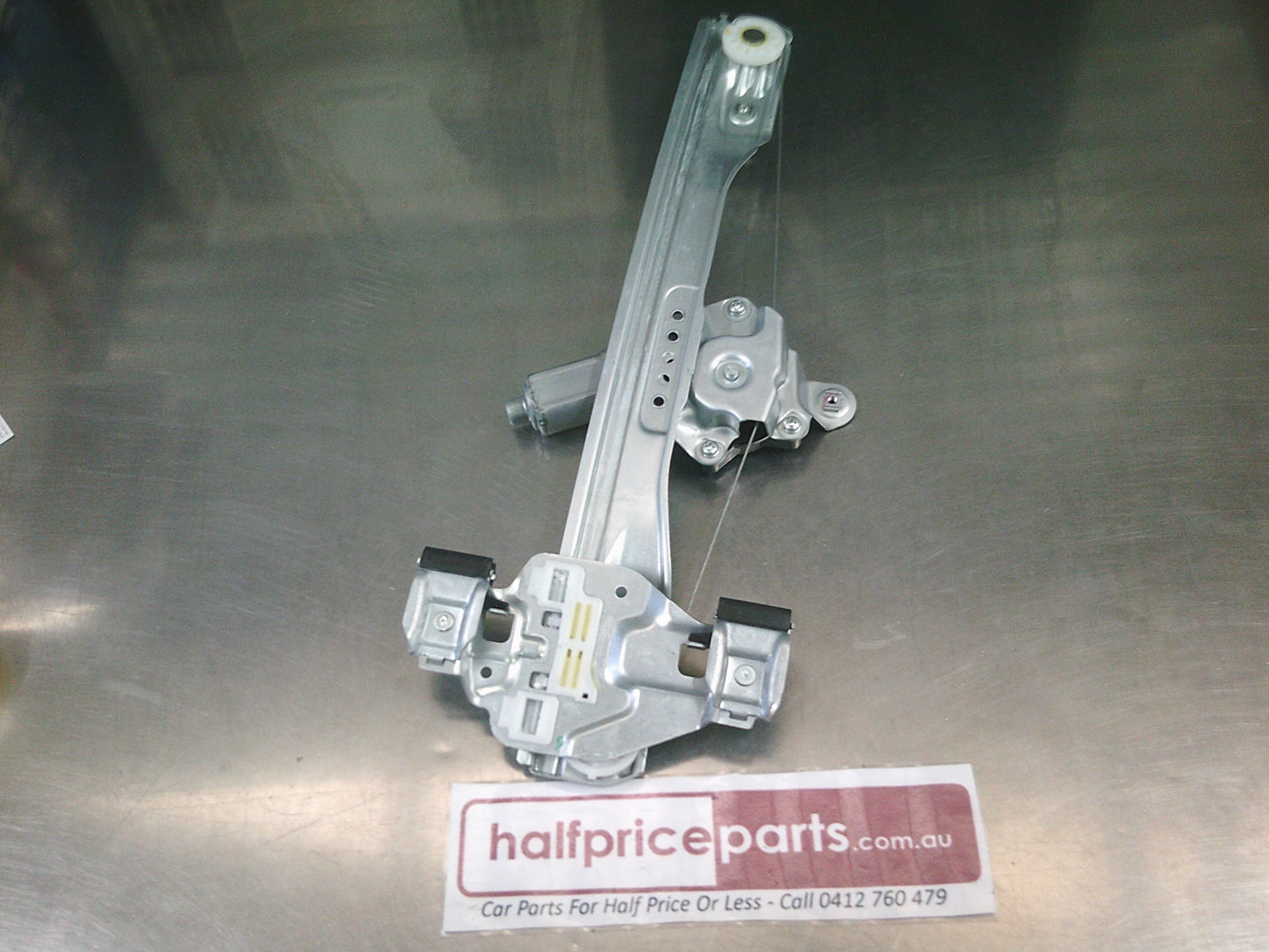 Holden JH Cruze Genuine Drivers Side Rear Power Window Regulator - New Part.