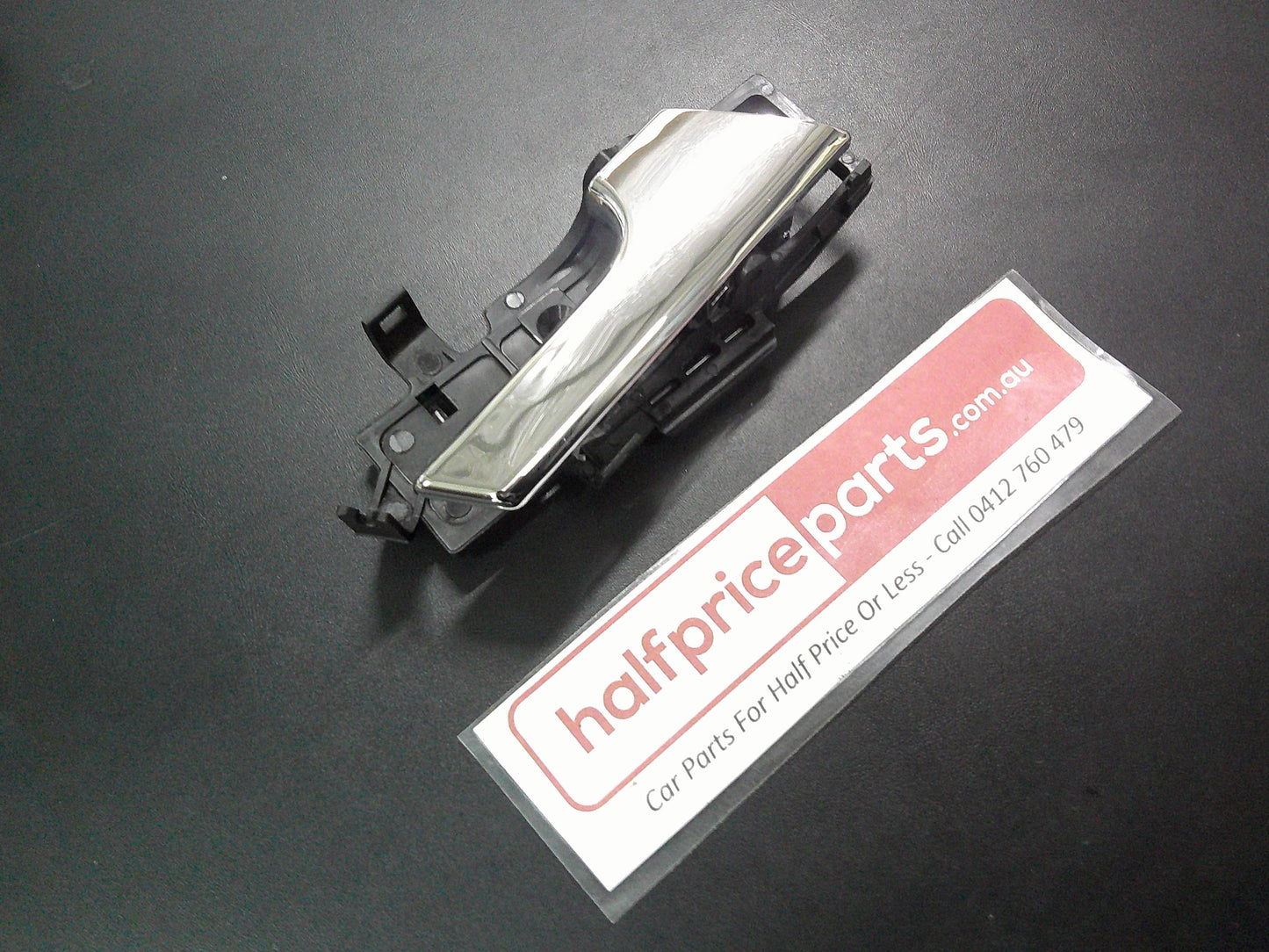Holden TK Barina Genuine Right Hand (Drivers) Front Door Inner Chrome Handle Assy New Part .