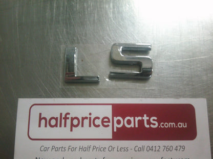Holden TJ Trax Genuine 'LS' Chrome Tailgate Badge - New Part